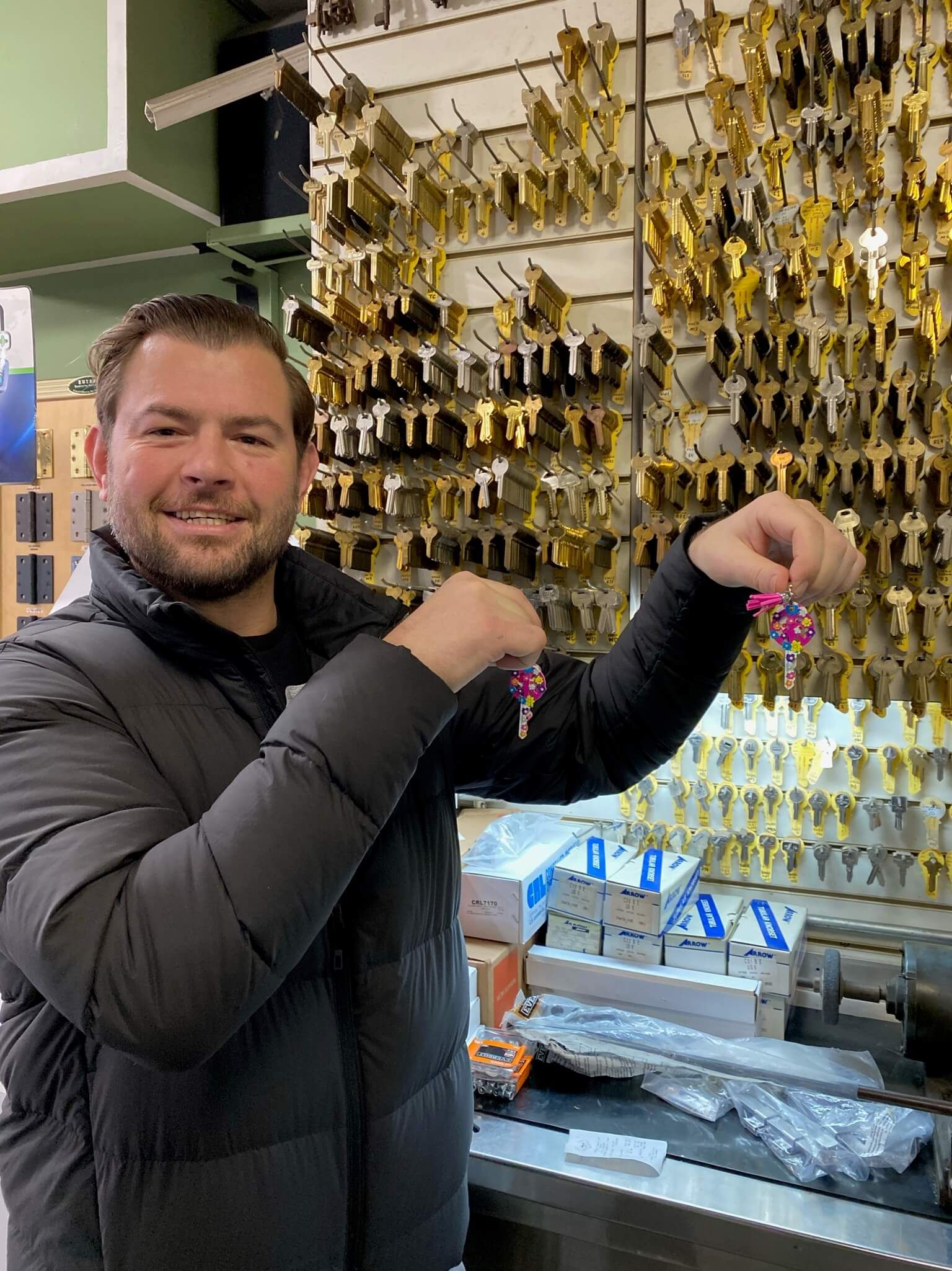 Happy Customer with a brand new set of keys at Speedy Lock and Door in the Lower East Side